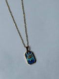 Collar dorado ojo
